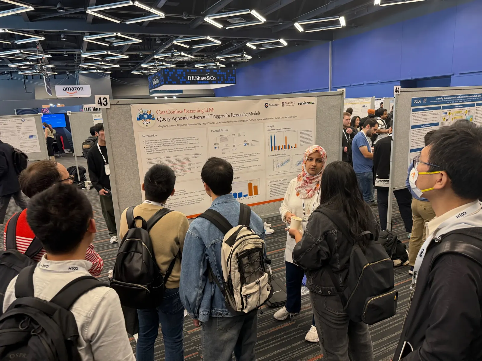 Attendees gathered around the Cats Confuse Reasoning LLM poster at the COLM 2025 poster session